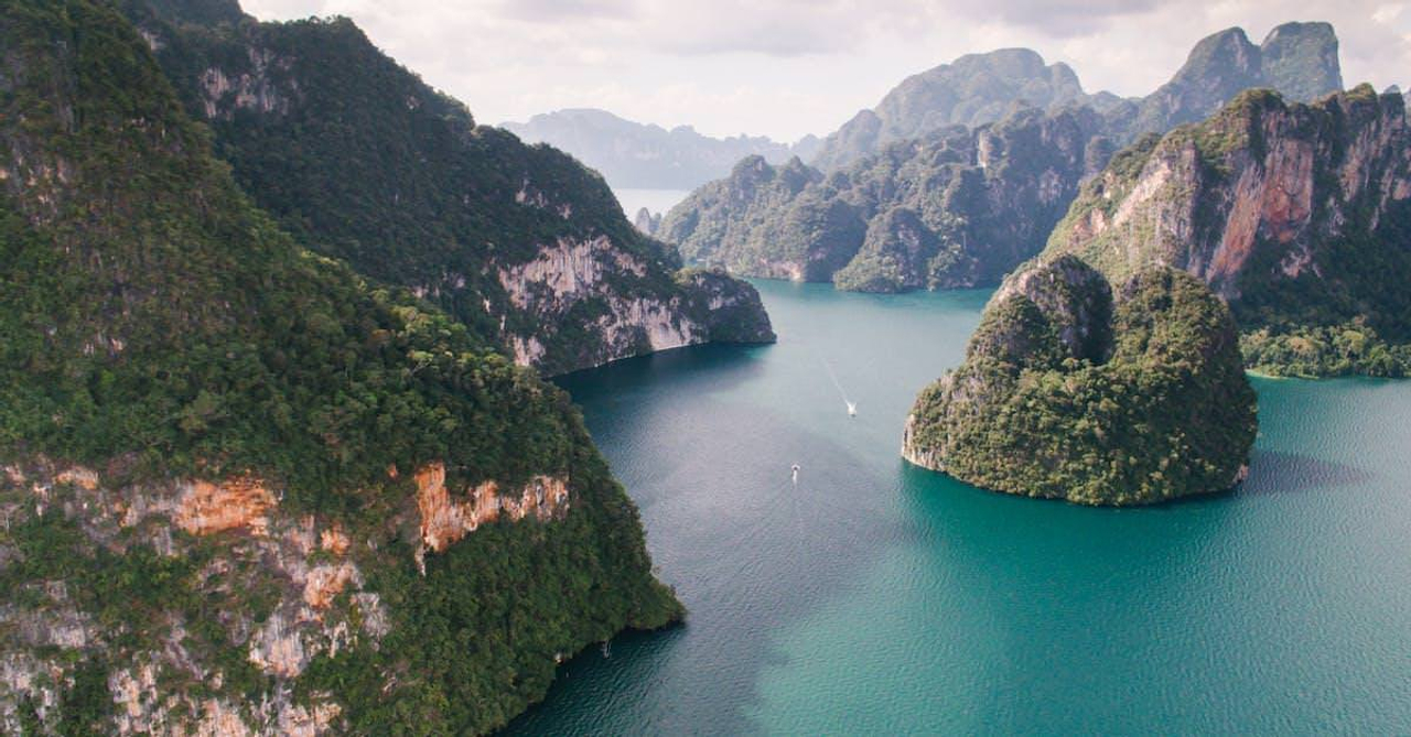 Drone Footage of f Rock Mountains in the Sea