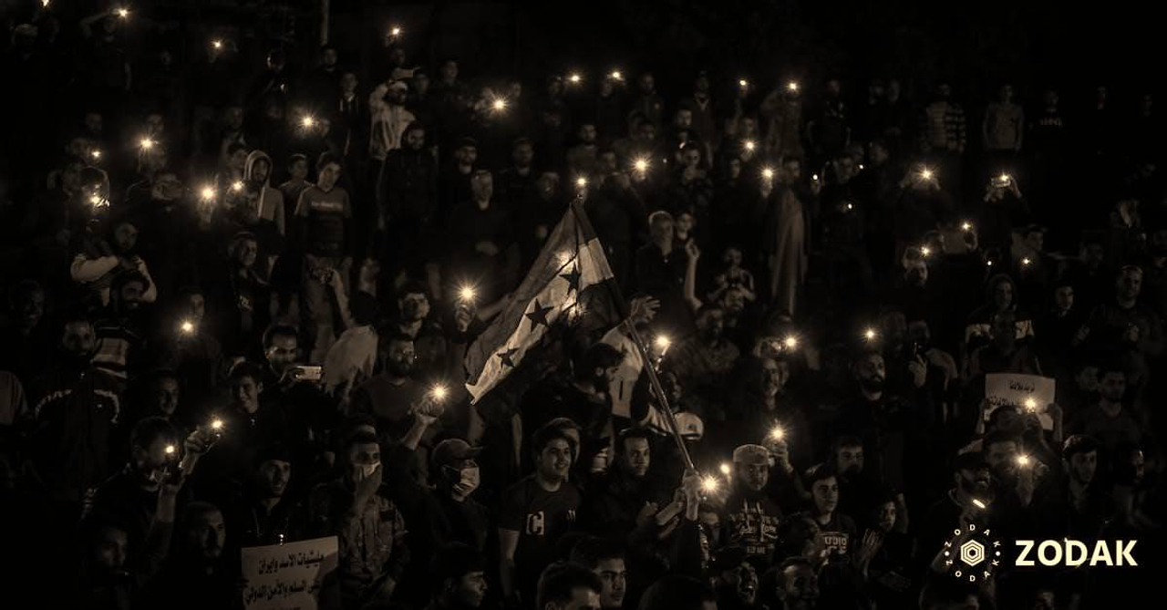 Crowd of people in protest on street