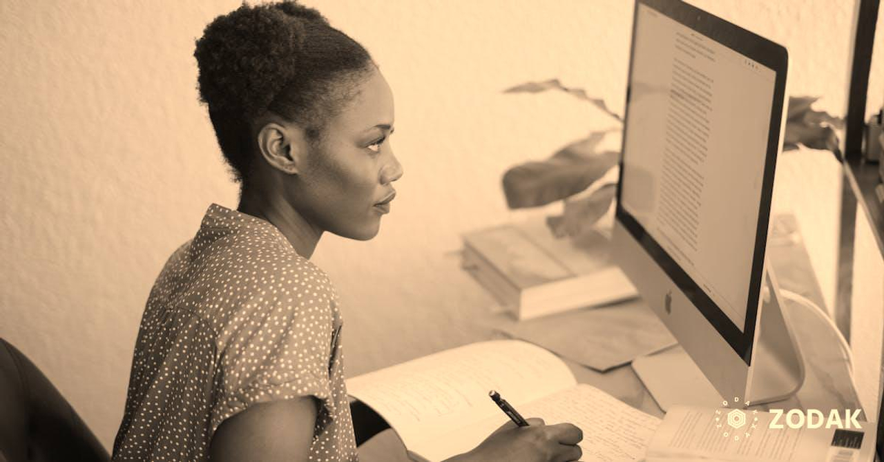 Photo Of Woman Looking On Computer