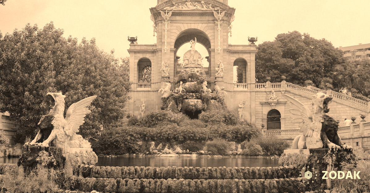 Aged masonry construction with animal sculptures and fountain with stairs in Citadel Park of Barcelona Spain