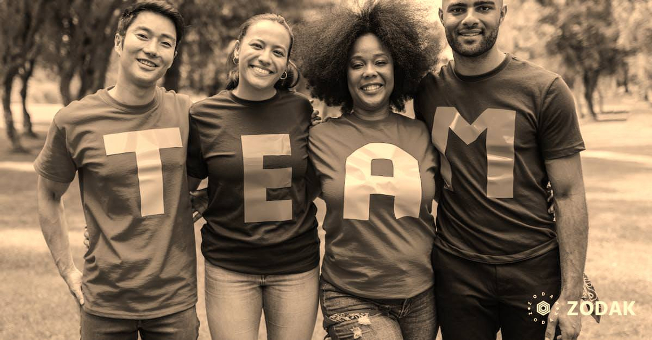 Group of People Wearing Shirts Spelled Team