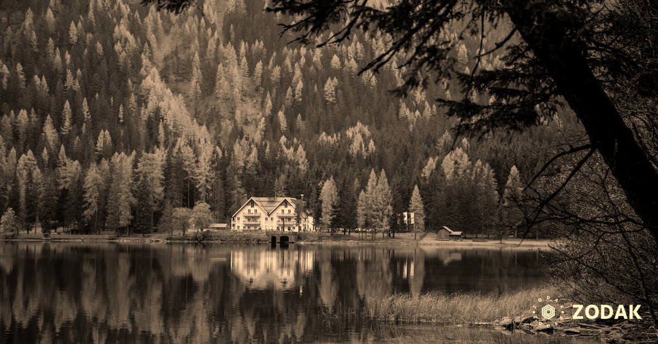 Picturesque view of lake and forest in mountains