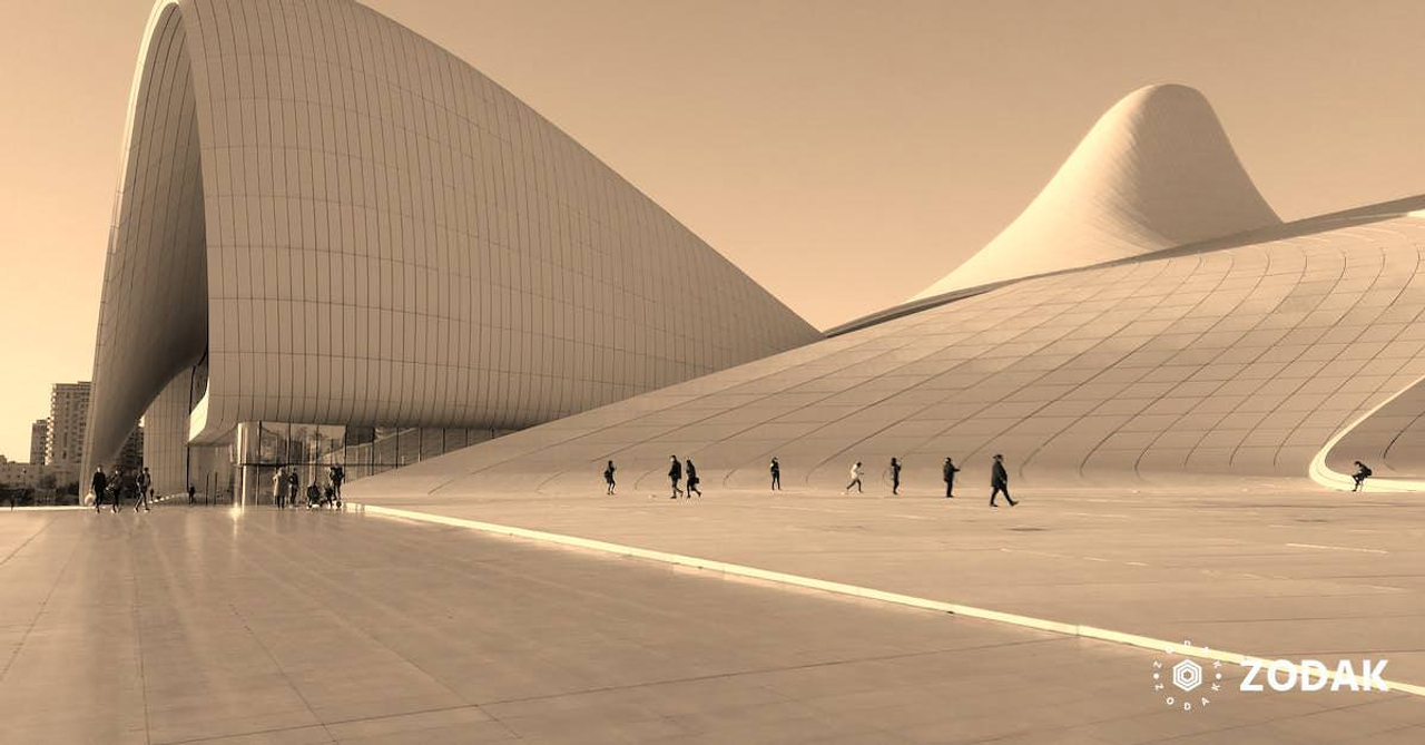 Photo of People Walking Near Building