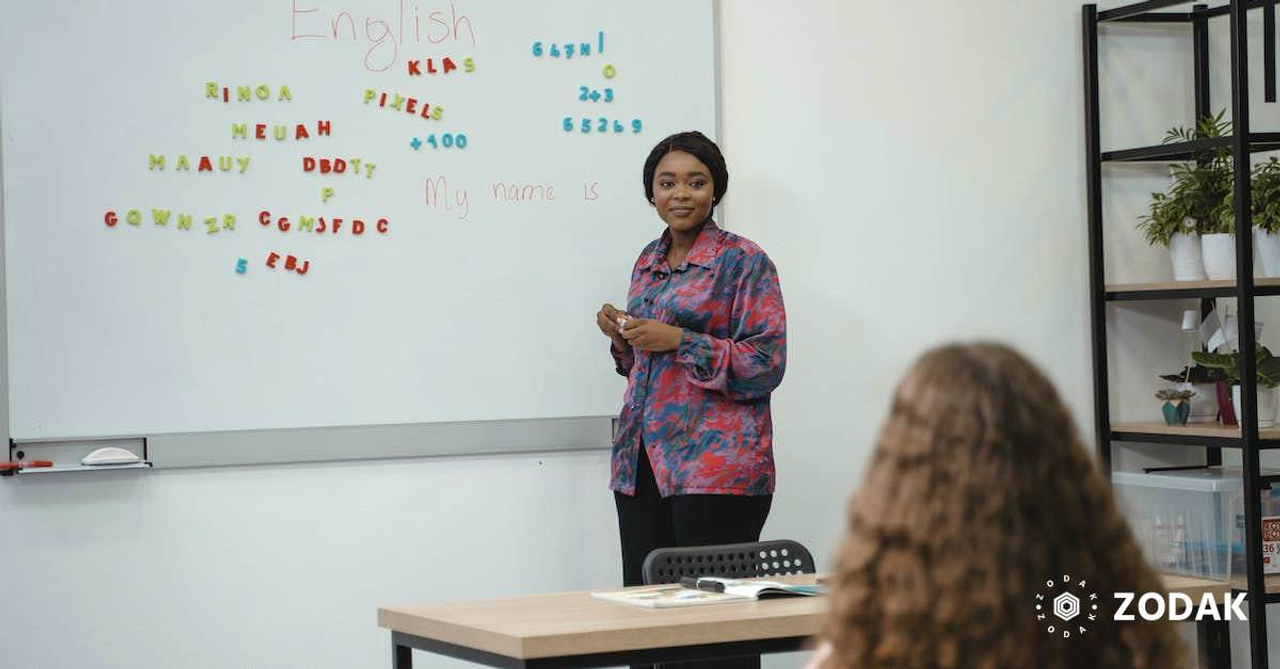 Woman Teaching English in Class