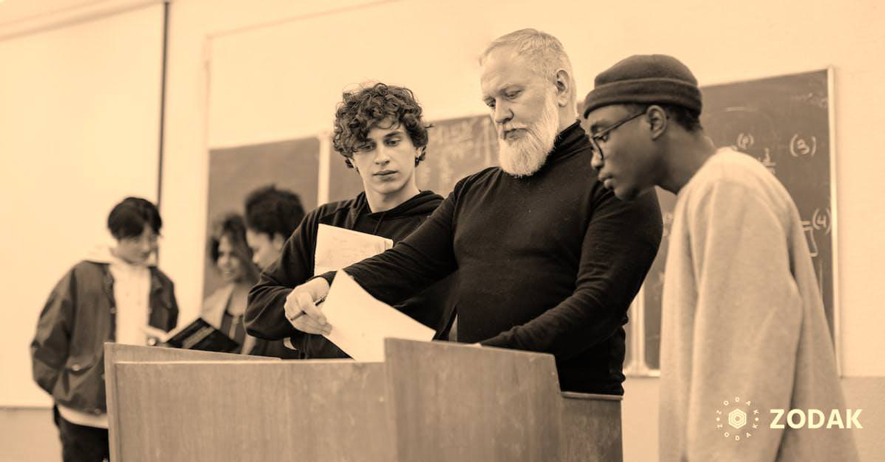 Students and Teacher in the Classroom Near Brown Table