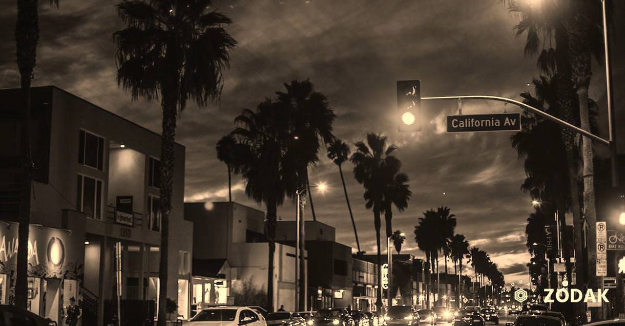 Busy city street in tropical town at night